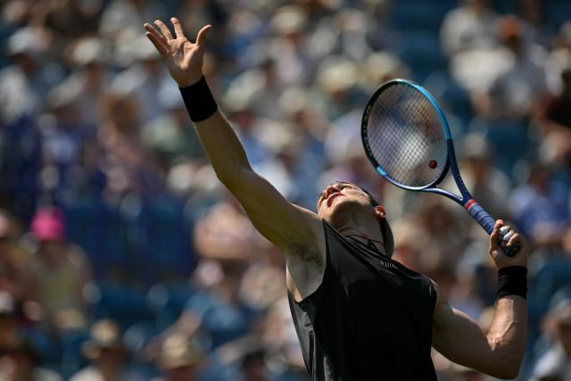 Britain's Jack Draper serves to US player Marcos Giron during their men's singles round of 32 tennis match on day one of the Lexus Eastbourne Open at Devonshire Park, Eastbourne, on the south coast of England on June 22, 2026. (Photo by Glyn KIRK / AFP)