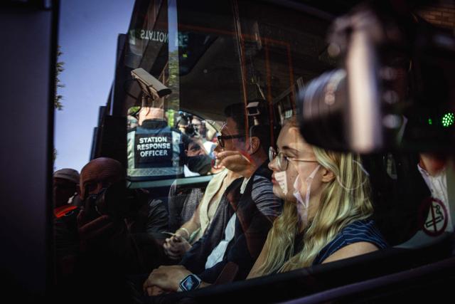 New Labour Party MP for Makerfield, Andy Burnham seen through the window of a London taxi, leaves Euston Station in London on June 22, 2026, having arrived from Manchester. British Prime Minister Keir Starmer announced his resignation on Monday after fewer than two years in office in a term characterised by policy U-turns and deep public unpopularity. Veteran politician Andy Burnham, who secured a return to parliament just last week, appeared poised to succeed Starmer after would-be rival Wes Streeting offered him his support. (Photo by Adrian Dennis / AFP)