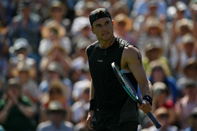 Britain's Jack Draper celebrates match point against US player Marcos Giron during their men's singles round of 32 tennis match on day one of the Lexus Eastbourne Open at Devonshire Park, Eastbourne, on the south coast of England on June 22, 2026. (Photo by Glyn KIRK / AFP)