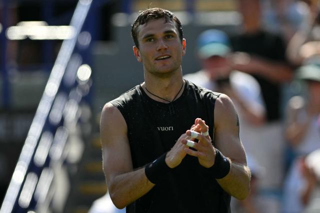 Britain's Jack Draper celebrates winning against US player Marcos Giron after their men's singles round of 32 tennis match on day one of the Lexus Eastbourne Open at Devonshire Park, Eastbourne, on the south coast of England on June 22, 2026. (Photo by Glyn KIRK / AFP)