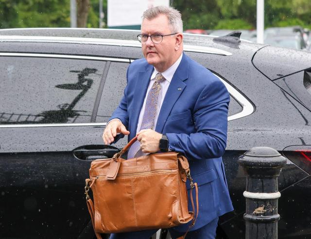 (FILES) Former leader of Northern Ireland's main pro-UK Democratic Unionist Party (DUP), Jeffrey Donaldson arrives at court in Newry in Northern Ireland, on June 19, 2026. A court on Monday, June 22, found Jeffrey Donaldson, the former leader of Northern Ireland's main pro-UK party, guilty of 18 historical sex offences, including rape. (Photo by Paul Faith / AFP)