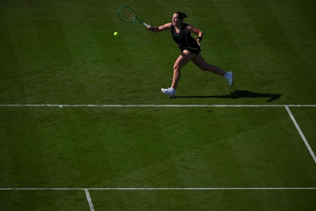 Latvia's Jelena Ostapenko returns to Britain's Francesca Jones during their women's singles round of 32 tennis match on day one of the Lexus Eastbourne Open at Devonshire Park, Eastbourne, on the south coast of England on June 22, 2026. (Photo by Glyn KIRK / AFP)