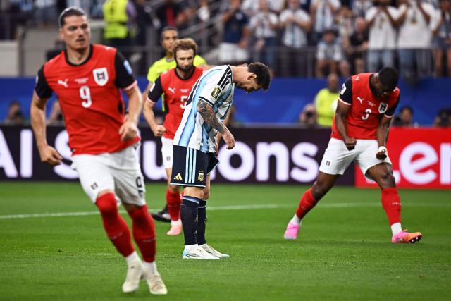Argentina's forward #10 Lionel Messi reacts after missing a penalty kick during the 2026 World Cup Group J football match between Argentina and Austria at the Dallas Stadium in Arlington on June 22, 2026.  (Photo by Paul ELLIS / AFP)