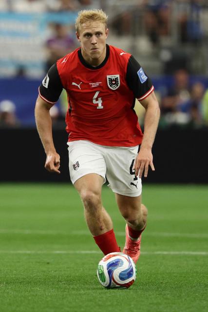 Austria's midfielder #04 Xaver Schlager runs with the ball during the 2026 World Cup Group J football match between Argentina and Austria at the Dallas Stadium in Arlington on June 22, 2026.  (Photo by Aric Becker / AFP)