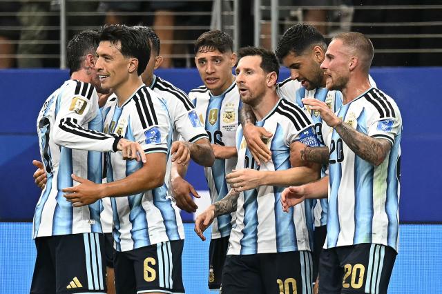 Argentina's forward #10 Lionel Messi (C) celebrates after scoring the opening goal during the 2026 World Cup Group J football match between Argentina and Austria at the Dallas Stadium in Arlington on June 22, 2026.  (Photo by Paul ELLIS / AFP)
