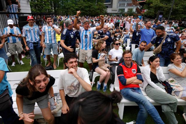 Argentina fans celebrate a goal as they attend a watch party for the 2026 World Cup football tournament match between Argentina and Austria, at Hudson Yards Backyard in New York City on June 22, 2026. (Photo by Leonardo MUNOZ / AFP)