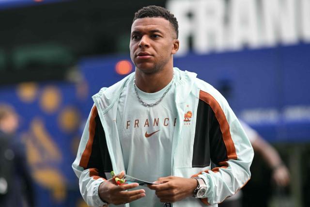 France's forward #10 Kylian Mbappe arrives ahead of the 2026 World Cup Group I football match between France and Iraq at the Philadelphia Stadium in Philadelphia on June 22, 2026.  (Photo by Mauro PIMENTEL / AFP)