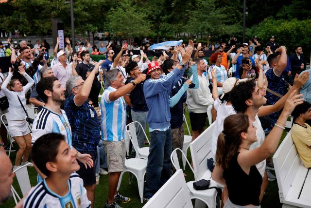 Argentina fans celebrate a goal during a watch party for the 2026 World Cup tournament match between Argentina and Austria at Hudson Yards Backyard in New York City on June 22, 2026. (Photo by Leonardo MUNOZ / AFP)