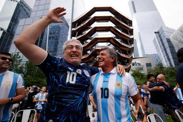Argentina fans celebrate a goal during a watch party for the 2026 World Cup tournament match between Argentina and Austria at Hudson Yards Backyard in New York City on June 22, 2026. (Photo by Leonardo MUNOZ / AFP)