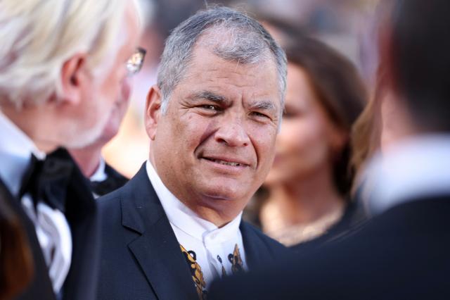 (FILES) Former Ecuador president Rafael Correa arrives for the screening of the film "The Six Billion Dollar Man" at the 78th edition of the Cannes Film Festival in Cannes, southern France, on May 21, 2025. The Ecuadorian government exposed on June 22, 2026 an alleged espionage network in Guayaquil, the country’s largest and busiest port, which it claimed was headed by former President (2007-2017) Rafael Correa. (Photo by Sameer AL-DOUMY / AFP)