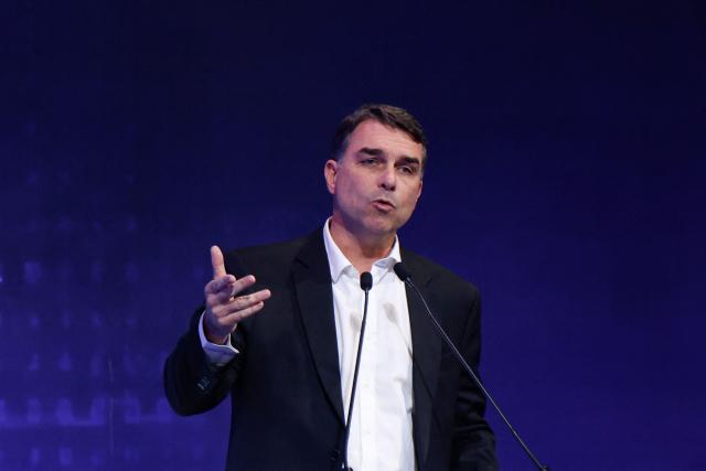 Brazilian Senator and presidential hopeful Flavio Bolsonaro speaks during the event "Industry on the Presidential Candidates’ Agenda" organized by the National Confederation of Industry in Brasilia, on June 22, 2026. (Photo by Sergio Lima / AFP)