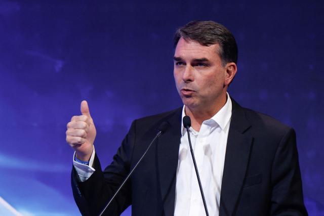 Brazilian Senator and presidential hopeful Flavio Bolsonaro speaks during the event "Industry on the Presidential Candidates’ Agenda" organized by the National Confederation of Industry in Brasilia, on June 22, 2026. (Photo by Sergio Lima / AFP)