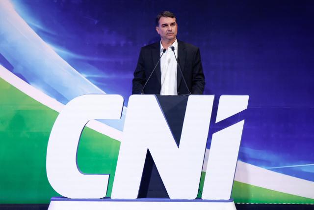 Brazilian Senator and presidential hopeful Flavio Bolsonaro speaks during the event "Industry on the Presidential Candidates’ Agenda" organized by the National Confederation of Industry in Brasilia, on June 22, 2026. (Photo by Sergio Lima / AFP)