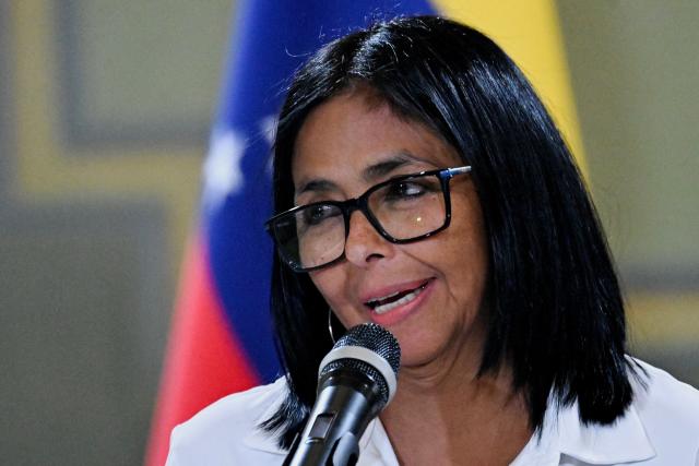 (FILES) Venezuela's interim President Delcy Rodriguez speaks during a press conference after a signing of an agreement ceremony between Chevron Venezuela and the national government at the Miraflores Palace in Caracas on April 13, 2026. The US capture of Nicolas Maduro put Venezuela on "the right path," interim leader Delcy Rodriguez said on June 22, 2026. (Photo by Juan BARRETO / AFP)