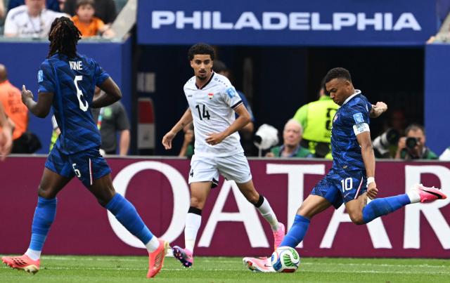 France's forward #10 Kylian Mbappe scores his team's first goal during the 2026 World Cup Group I football match between France and Iraq at the Philadelphia Stadium in Philadelphia on June 22, 2026.  (Photo by ROBERTO SCHMIDT / AFP)