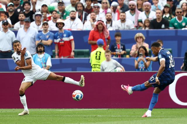 France's forward #10 Kylian Mbappe scores his team's first goal during the 2026 World Cup Group I football match between France and Iraq at the Philadelphia Stadium in Philadelphia on June 22, 2026.  (Photo by FRANCK FIFE / AFP)