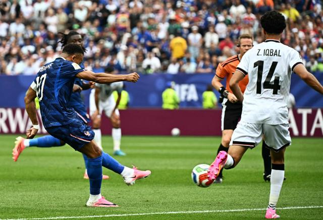 France's forward #10 Kylian Mbappe scores his team's first goal during the 2026 World Cup Group I football match between France and Iraq at the Philadelphia Stadium in Philadelphia on June 22, 2026.  (Photo by Jewel SAMAD / AFP)