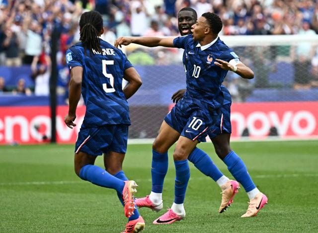 France's forward #10 Kylian Mbappe celebrates scoring his team's first goal during the 2026 World Cup Group I football match between France and Iraq at the Philadelphia Stadium in Philadelphia on June 22, 2026.  (Photo by Jewel SAMAD / AFP)