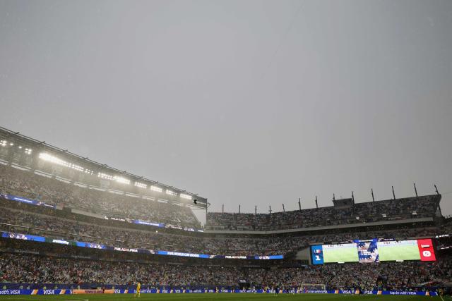 Rain falls on the pitch during the 2026 World Cup Group I football match between France and Iraq at the Philadelphia Stadium in Philadelphia on June 22, 2026.  (Photo by FRANCK FIFE / AFP)