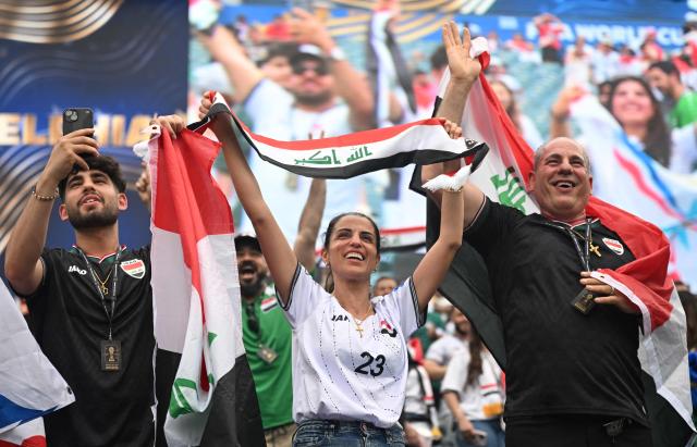 Iraq's fans cheer their team during the 2026 World Cup Group I football match between France and Iraq at Philadelphia Stadium in Philadelphia on June 22, 2026.  (Photo by Jewel SAMAD / AFP)