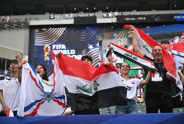 Iraq's fans cheer their team during the 2026 World Cup Group I football match between France and Iraq at Philadelphia Stadium in Philadelphia on June 22, 2026.  (Photo by Jewel SAMAD / AFP)
