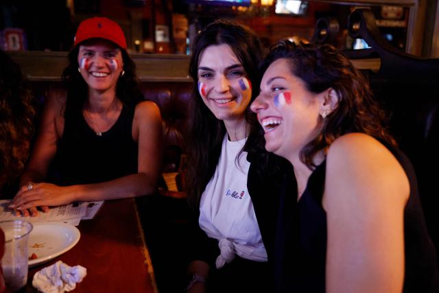 France fans watch the 2026 World Cup tournament match between France and Iraq in New York City on June 22, 2026. (Photo by Leonardo MUNOZ / AFP)
