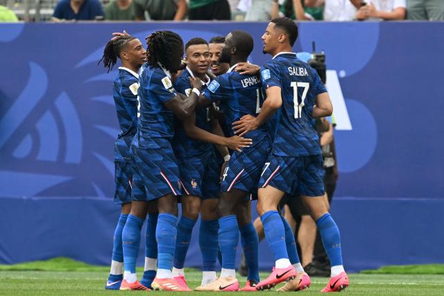 France's forward #10 Kylian Mbappe celebrates scoring his team's first goal with teammates during the 2026 World Cup Group I football match between France and Iraq at the Philadelphia Stadium in Philadelphia on June 22, 2026.  (Photo by ROBERTO SCHMIDT / AFP)