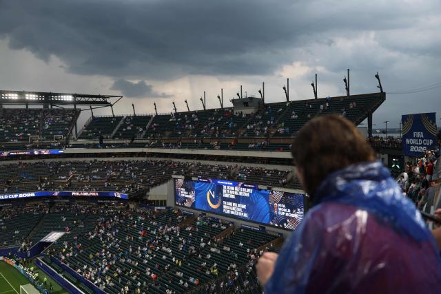A looks from the stands as the 2026 World Cup Group I football match between France and Iraq is suspended due to adverse weather at the Philadelphia Stadium in Philadelphia on June 22, 2026.  (Photo by FRANCK FIFE / AFP)