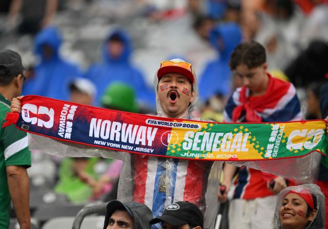 A Norwegian fan shows a scarf ahead of the 2026 World Cup Group I football match between Norway and Senegal at the New York/New Jersey Stadium in East Rutherford on June 22, 2026.  (Photo by ANGELA WEISS / AFP)