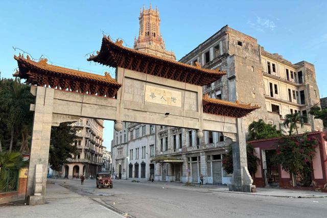 View of the Gateway to Havana’s Chinatown in Havana on June 22, 2026. (Photo by Pablo PORCIUNCULA / AFP)