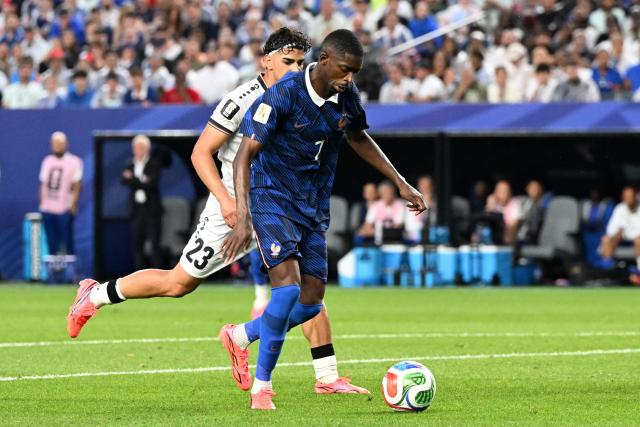 France's forward #07 Ousmane Dembele scores his team's third goal during the 2026 World Cup Group I football match between France and Iraq at the Philadelphia Stadium in Philadelphia on June 22, 2026.  (Photo by ROBERTO SCHMIDT / AFP)