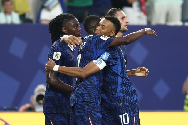 France's forward #07 Ousmane Dembele (L) celebrates scoring his team's third goal with teammate forward #10 Kylian Mbappe during the 2026 World Cup Group I football match between France and Iraq at the Philadelphia Stadium in Philadelphia on June 22, 2026.  (Photo by FRANCK FIFE / AFP)