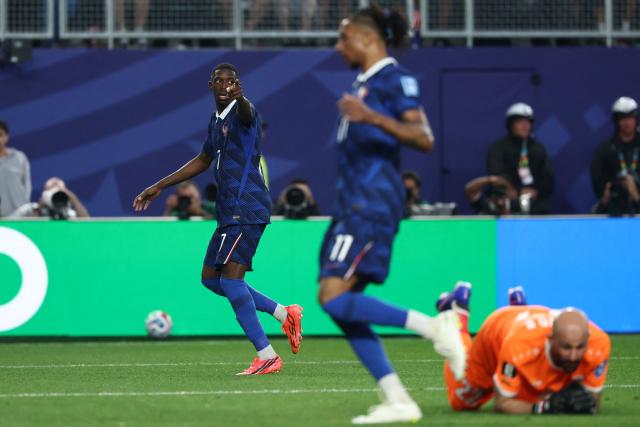 France's forward #07 Ousmane Dembele celebrates scoring his team's third goal past Iraq's goalkeeper #22 Ahmed Basil during the 2026 World Cup Group I football match between France and Iraq at the Philadelphia Stadium in Philadelphia on June 22, 2026.  (Photo by FRANCK FIFE / AFP)
