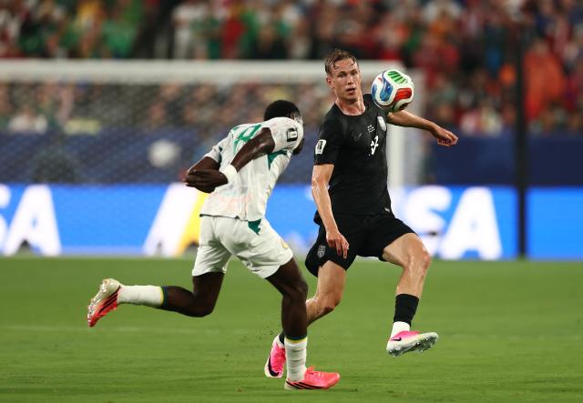 Senegal's midfielder #08 Lamine Camara and Norway's midfielder #18 Kristian Thorstvedt fight for the ball during the 2026 World Cup Group I football match between Norway and Senegal at the New York/New Jersey Stadium in East Rutherford on June 22, 2026. (Photo by Charly TRIBALLEAU / AFP)
