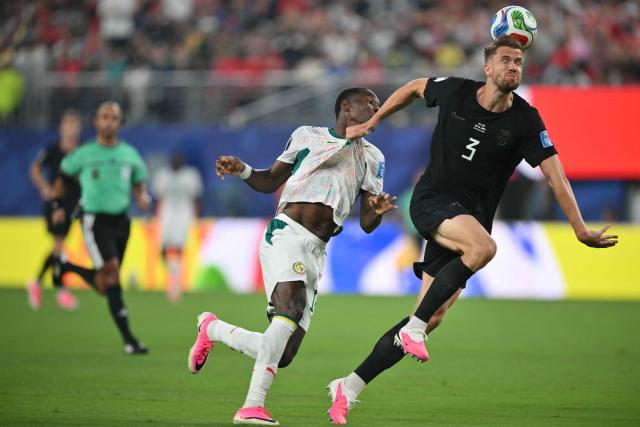 Senegal's forward #11 Nicolas Jackson and Norway's defender #03 Kristoffer Vassbakk Ajer fight for the ball during the 2026 World Cup Group I football match between Norway and Senegal at the New York/New Jersey Stadium in East Rutherford on June 22, 2026. (Photo by Angela WEISS / AFP)