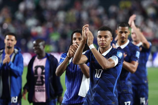 France's forward #10 Kylian Mbappe celebrates with fans after winning the 2026 World Cup Group I football match between France and Iraq at the Philadelphia Stadium in Philadelphia on June 22, 2026.  (Photo by FRANCK FIFE / AFP)