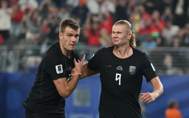 Norway's forward #09 Erling Braut Haaland celebrates scoring his team's second goal with  forward #07 Alexander Sorloth during the 2026 World Cup Group I football match between Norway and Senegal at the New York/New Jersey Stadium in East Rutherford on June 22, 2026. (Photo by Angela WEISS / AFP)