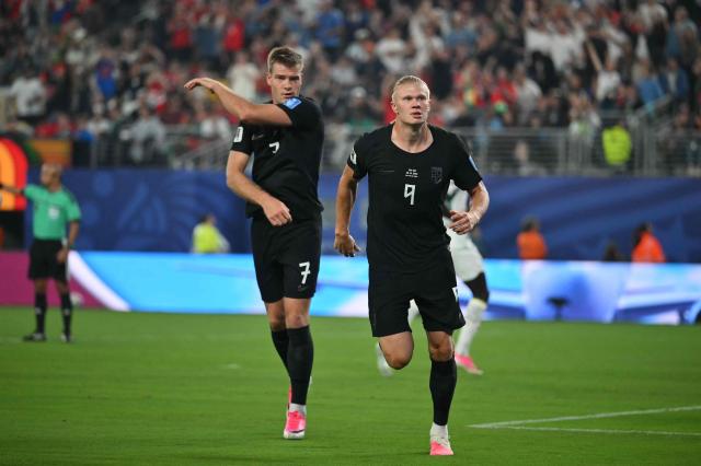 Norway's forward #09 Erling Braut Haaland celebrates scoring his team's second goal with forward #07 Alexander Sorloth during the 2026 World Cup Group I football match between Norway and Senegal at the New York/New Jersey Stadium in East Rutherford on June 22, 2026. (Photo by Angela WEISS / AFP)