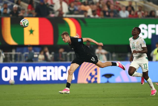 Norway's defender #17 Torbjorn Heggem and Senegal's forward #11 Nicolas Jackson fight for the ball during the 2026 World Cup Group I football match between Norway and Senegal at the New York/New Jersey Stadium in East Rutherford on June 22, 2026.  (Photo by Charly TRIBALLEAU / AFP)