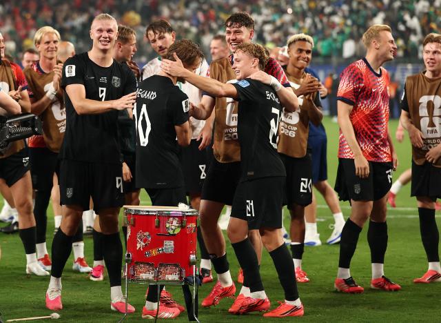 (From L) Norway's forward #09 Erling Braut Haaland, midfielder #10 Martin Odegaard and midfielder #21 Andreas Schjelderup celebrate after winning the 2026 World Cup Group I football match between Norway and Senegal at the New York/New Jersey Stadium in East Rutherford on June 22, 2026. (Photo by Charly TRIBALLEAU / AFP)
