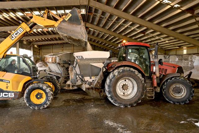 A photo taken on June 22, 2026 shows a farmer loading fertiliser into a spreader at a fertiliser depot in the small rural town of Buffalo, some 163kms south-west of Melbourne. Importing 90 percent of fertilisers, Australia is facing a severe shortage due to the closure of the Strait of Hormuz. (Photo by William WEST / AFP)