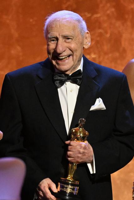 (FILES) US actor Mel Brooks poses with his Academy Honorary Award during the Academy of Motion Picture Arts and Sciences' 14th Annual Governors Awards at the Ray Dolby Ballroom in Los Angeles on January 9, 2024. US film director, actor, and producer Mel Brooks turns 100 on Sunday, June 28, 2026. (Photo by Robyn BECK / AFP)