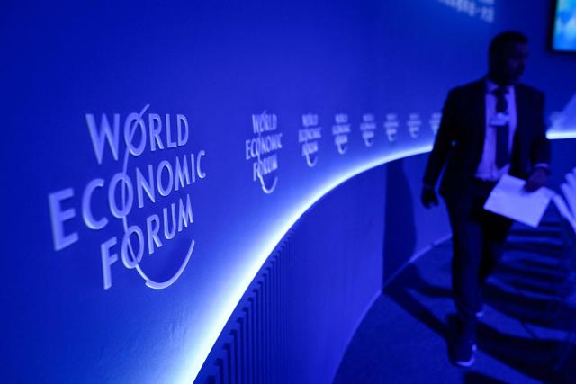A participant attends a seminar group at the Dalian International Conference Centre during the World Economic Forum Annual Meeting of the New Champions in Dalian, China's Liaoning province on June 23, 2026. (Photo by WANG Zhao / AFP)