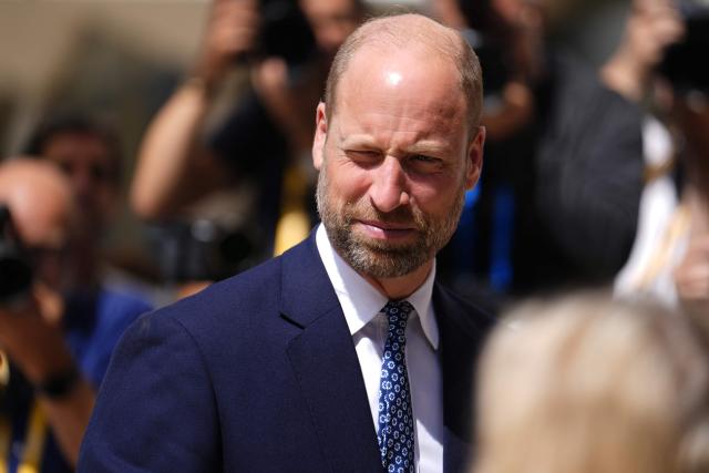 Britain's Prince William, Prince of Wales squints as he stand in the sunlight as he arrives to attend the Climate Innovation Forum at the Guildhall in central London, on June 23, 2026. (Photo by Jordan Pettitt / POOL / AFP)