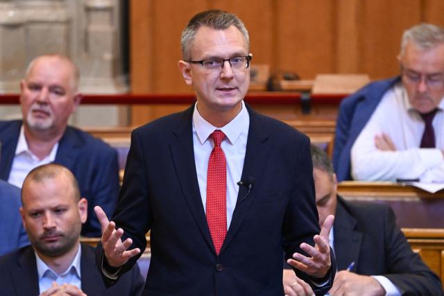 Christian Democratic People Party's (KDNP) parliamentary faction leader Bence Retvari addresses parliament after members of parliament voted for new legislation in the main hall of the Parliament on June 23, 2026, during an extraordinary session of the National Assembly. Hungarian lawmakers on June 23 approved anti-corruption measures, part of new Prime Minister Peter Magyar's sweeping reform drive and aimed at helping the country get billions of euros in withheld European Union funds. The EU announced late last month it would unlock more than 16 billion euros (USD 18 billion) for Hungary that had been frozen over rule-of-law concerns during nationalist Viktor Orban's rule, if Budapest stays on track with a major reform push. (Photo by Attila KISBENEDEK / AFP)