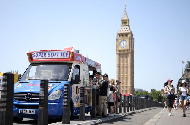 People buy ice-cream in Westminster, on a hot summer's day, in London on June 23, 2026. (Photo by Toby Shepheard / AFP)