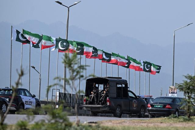 The motorcade of Iran's President Masoud Pezeshkian makes its way upon his arrival in Islamabad on June 23, 2026 amid US-Iran peace talks. Iranian Foreign Minister Abbas Araghchi arrived in Islamabad on June 23, Iran's state media reported, as President Masoud Pezeshkian also travelled to Pakistan, which acts as a mediator in talks between Tehran and Washington. (Photo by Aamir QURESHI / AFP)