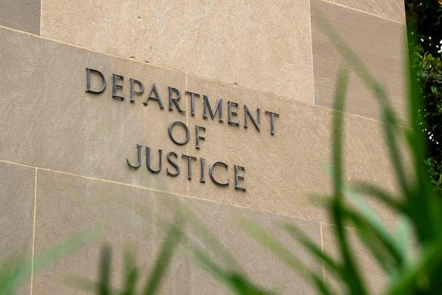 The exterior of the Department of Justice is seen ahead of a press conference with Acting Attorney General Todd Blanche announcing annual healthcare fraud takedown results in Washington, DC on June 23, 2026. (Photo by Ken Cedeno / AFP)