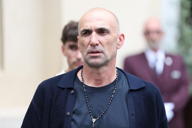 Former French player Jérôme Alonzo arrives at the funeral ceremony of Eric Roy at the Cathédrale Sainte-Réparate in Nice, Southeastern France, on June 23, 2026. (Photo by Valery HACHE / AFP)