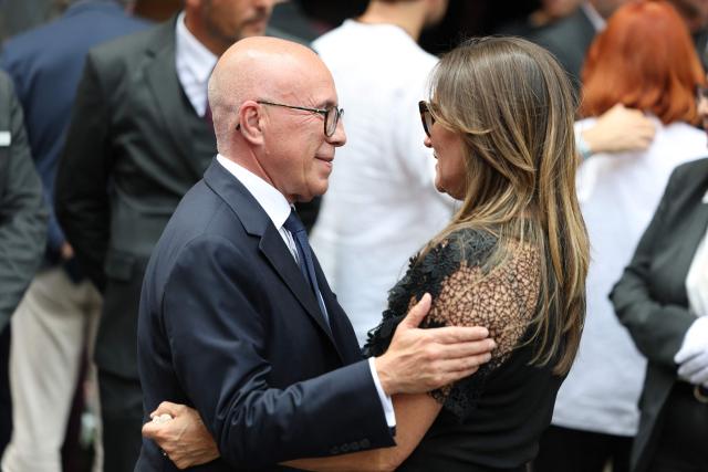 Mayor of Nice Eric Ciotti (L) arrives at the funeral ceremony of Eric Roy at the Cathédrale Sainte-Réparate in Nice, Southeastern France, on June 23, 2026. (Photo by Valery HACHE / AFP)